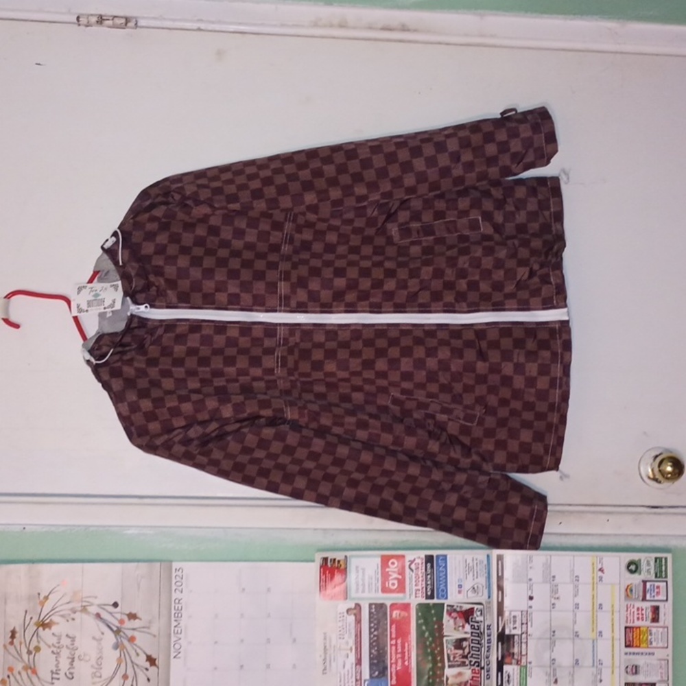 A rain jacket with hood